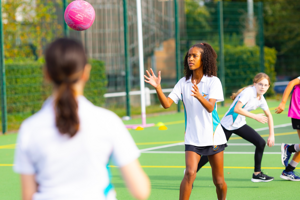 Teddington School - Students Passing a Netball