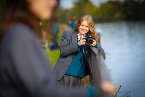 Teddington School - Student Taking Photography by Water